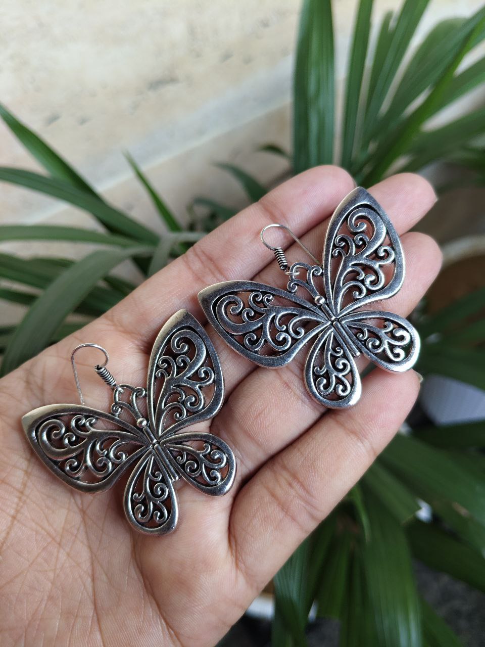 German Silver Butterfly Dangler Earrings